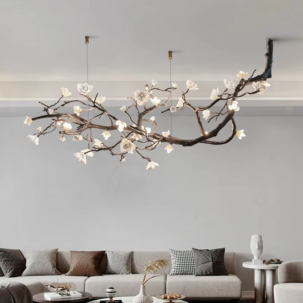This is a natural artistic flower branch chandelier, with metal branches and white flower shapes, featuring a strong natural artistic sense and elegant fresh style. It is used for space lighting and decoration, creating a natural artistic atmosphere. It is suitable for new Chinese-style home restaurants, homestay leisure areas, artistic-style living rooms and other places.