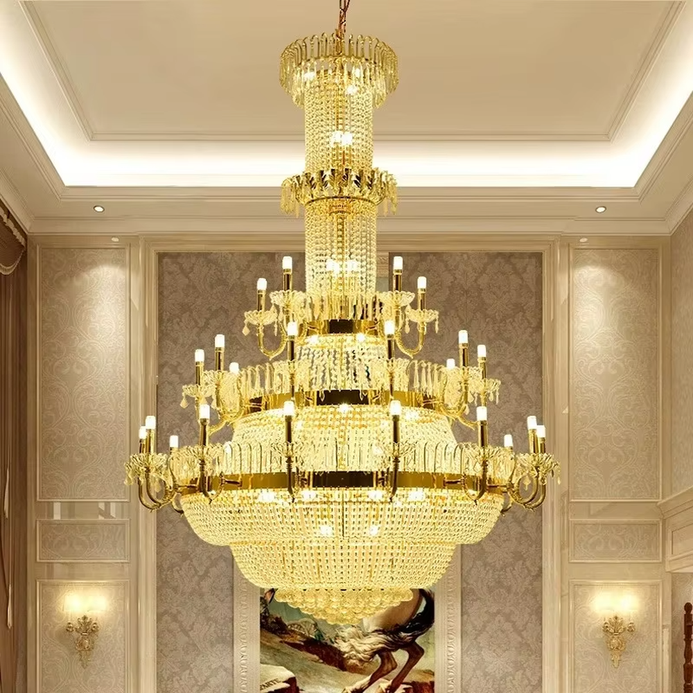 This is a European luxury golden crystal chandelier, with a golden metal frame, multi-layer transparent crystal pendants, and multi-arm design, featuring brilliant lighting, strong luxury sense and visual impact. It is used for space lighting and decoration, creating a high-end luxury atmosphere. It is suitable for luxury villa living rooms, high-end hotel lobbies, banquet halls and other places.