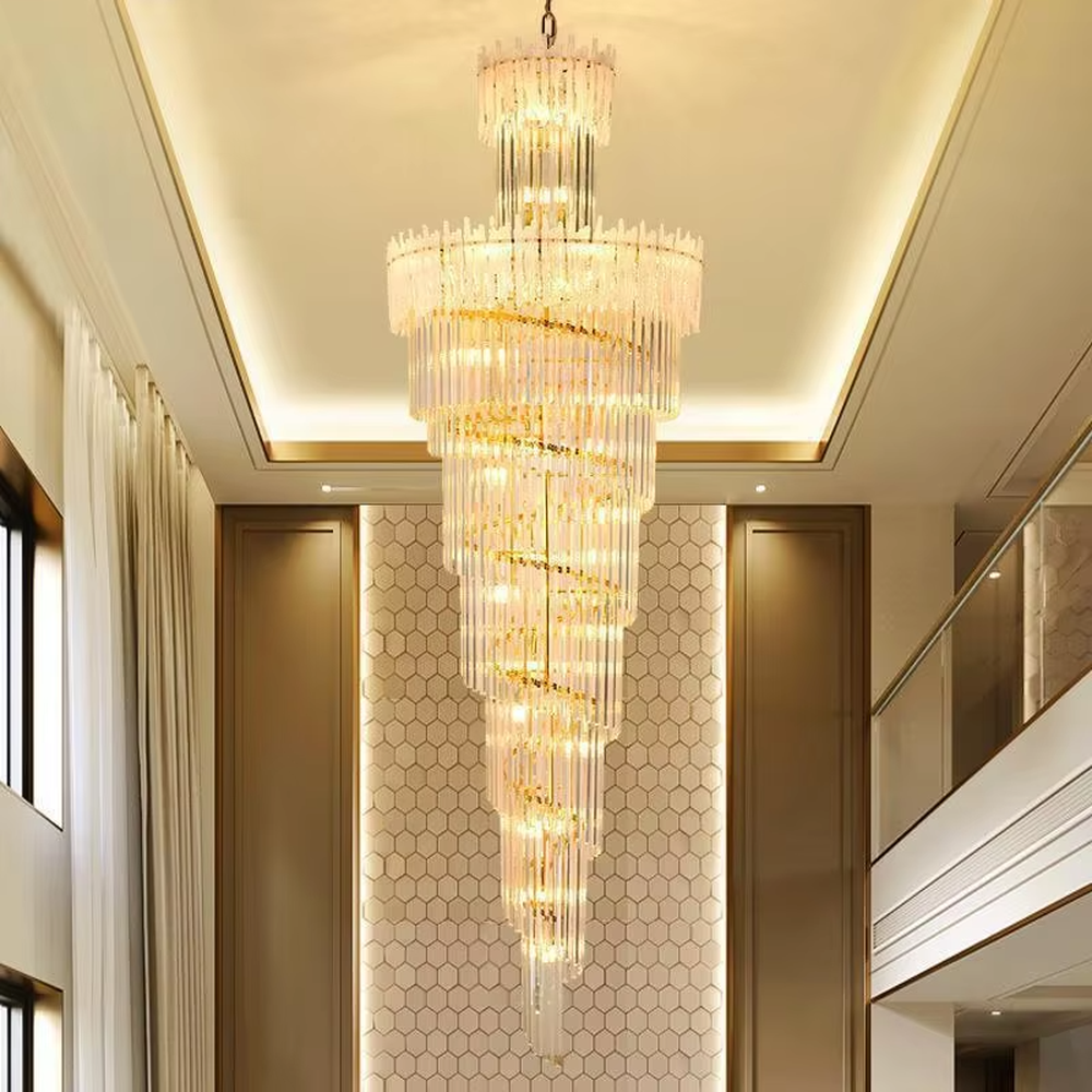 This is a modern luxurious large spiral crystal chandelier, with a golden metal frame paired with transparent crystal strips arranged in multiple spirals. It features a strong sense of spatial depth and artistry, with brilliant and grand lighting. It is used for space lighting and artistic decoration, creating a luxurious and high-end atmosphere. Suitable for high-ceiling lobbies of high-end hotels, double-height living rooms in luxury villas, large commercial clubs and other places.