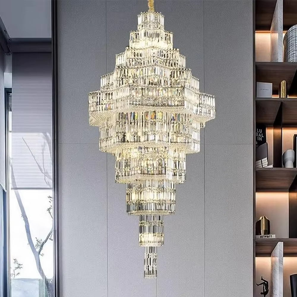 This is a luxury multi-layer pagoda-shaped crystal chandelier, with transparent crystal components in a multi-layer pagoda shape, brilliant lighting, featuring a magnificent and luxurious design with strong visual impact. It is used for space lighting and decoration, creating a high-end luxury atmosphere. It is suitable for high-end hotel lobbies, luxury villa high-ceilinged living rooms, large commercial exhibition halls and other places.