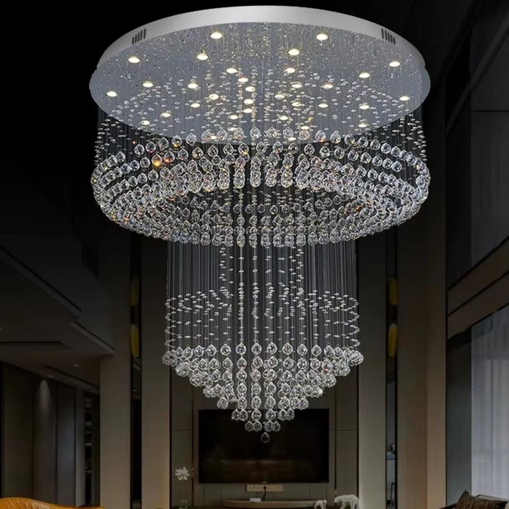 This is a multi-layered cascading crystal ceiling light, composed of numerous stacked crystal beads and components. It has a three-dimensional and layered shape, translucent and brilliant under light. It is used for space lighting and luxurious decoration, combining practicality and artistry to significantly enhance the space’s grade. It is suitable for high-end hotel lobbies, luxury villa living rooms, large banquet halls and other high-end places.