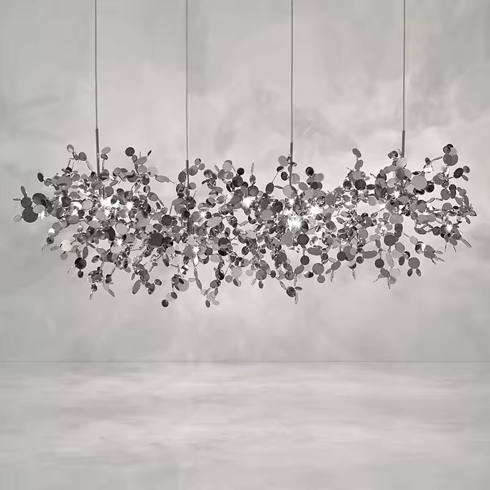 This is an artistic installation-style metal disc chandelier, with numerous metal discs interwoven in a scattered manner, featuring strong artistic sense and modern style, and the light reflects a brilliant visual effect. It is used for space lighting and artistic decoration, creating an artistic and modern atmosphere. It is suitable for art exhibition halls, high-end hotel lobbies, modern art home living rooms and other places.