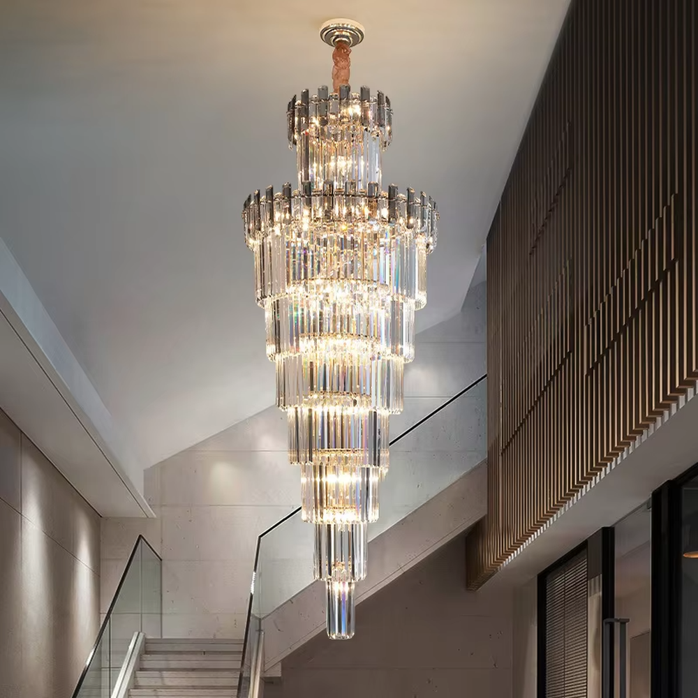 Luxurious multi-layer column crystal tower chandelier, golden frame paired with transparent long crystals, layered decreasing shape, brilliant and gorgeous lighting, creating a high-end luxurious atmosphere.