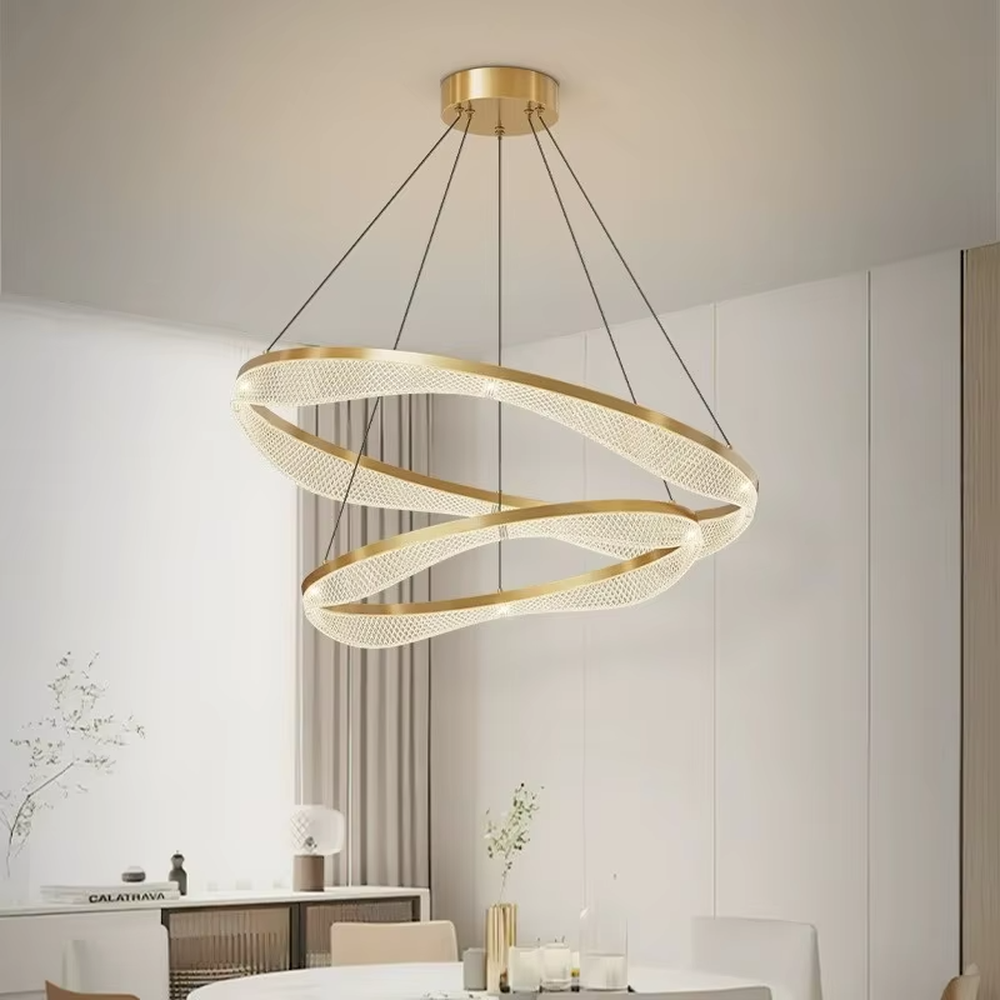 This is a modern luxury multi-layer circular chandelier, with golden metal circular frames hanging in a scattered manner, featuring artistic layers and strong luxury sense. It is used for space lighting and decoration, creating a high-end artistic atmosphere. It is suitable for high-ceilinged living rooms, high-end hotel lobbies, modern art exhibition halls and other places.