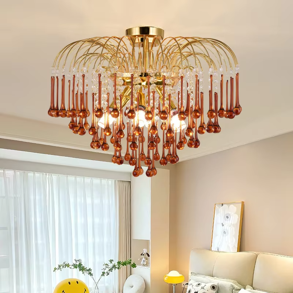 This is a luxurious classical golden multi-layer crystal chandelier, with a golden metal frame paired with numerous transparent crystal pendants. It features a magnificent and grand design, with brilliant lighting. It is used for space lighting and decoration, creating a luxurious and noble atmosphere. Suitable for luxury living rooms, high-end hotel lobbies, villa banquet halls and other places.