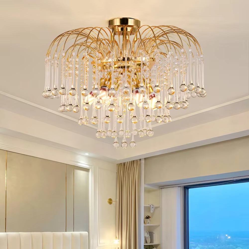This is a luxurious classical golden multi-layer crystal chandelier, with a golden metal frame paired with numerous transparent crystal pendants. It features a magnificent and grand design, with brilliant lighting. It is used for space lighting and decoration, creating a luxurious and noble atmosphere. Suitable for luxury living rooms, high-end hotel lobbies, villa banquet halls and other places.