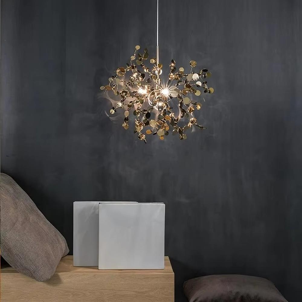 This is an artistic installation-style metal disc chandelier, with numerous metal discs interwoven in a scattered manner, featuring strong artistic sense and modern style, and the light reflects a brilliant visual effect. It is used for space lighting and artistic decoration, creating an artistic and modern atmosphere. It is suitable for art exhibition halls, high-end hotel lobbies, modern art home living rooms and other places.
