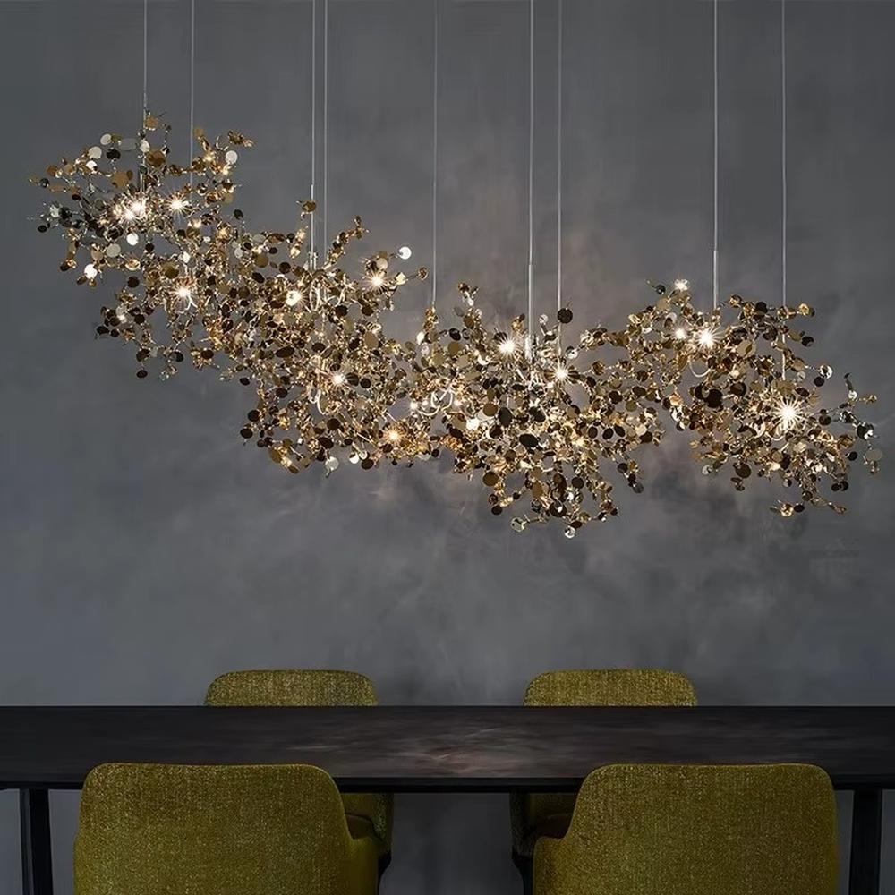 This is an artistic installation-style metal disc chandelier, with numerous metal discs interwoven in a scattered manner, featuring strong artistic sense and modern style, and the light reflects a brilliant visual effect. It is used for space lighting and artistic decoration, creating an artistic and modern atmosphere. It is suitable for art exhibition halls, high-end hotel lobbies, modern art home living rooms and other places.