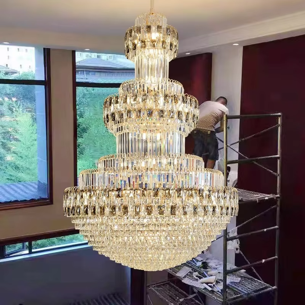 Luxurious multi-layer crystal tower chandelier, golden metal frame paired with transparent crystals, layered increasing shape, brilliant and gorgeous lighting, creating a high-end luxurious space atmosphere.
