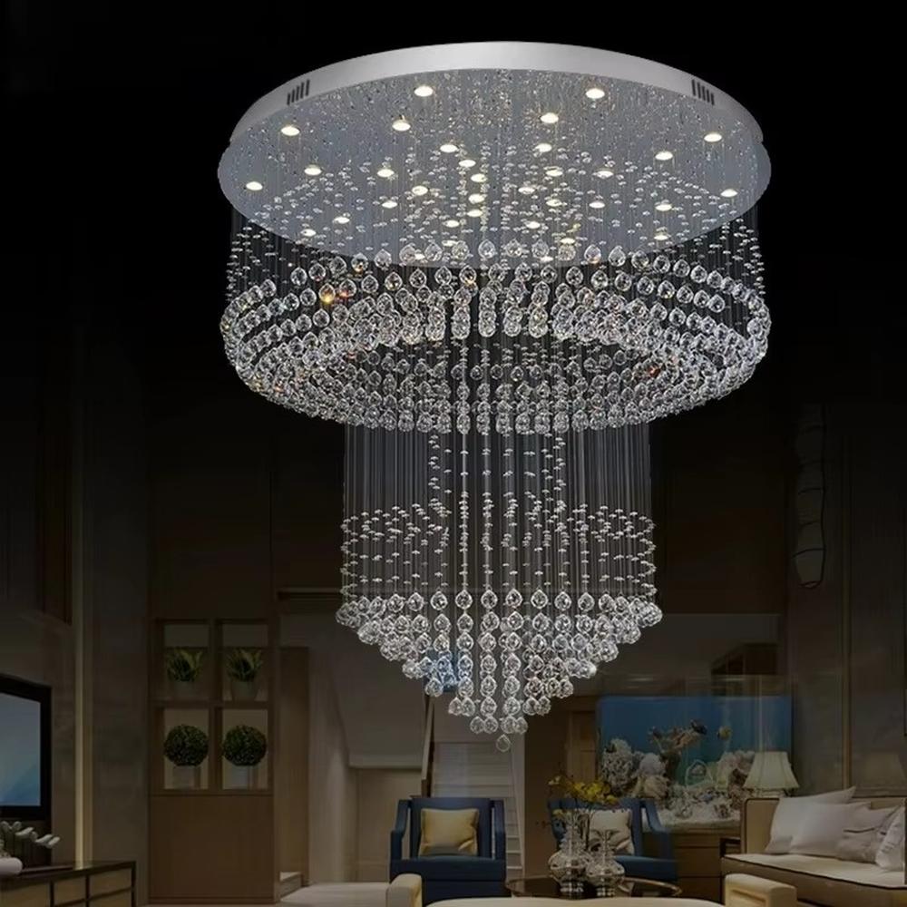 This is a multi-layered cascading crystal ceiling light, composed of numerous stacked crystal beads and components. It has a three-dimensional and layered shape, translucent and brilliant under light. It is used for space lighting and luxurious decoration, combining practicality and artistry to significantly enhance the space’s grade. It is suitable for high-end hotel lobbies, luxury villa living rooms, large banquet halls and other high-end places.