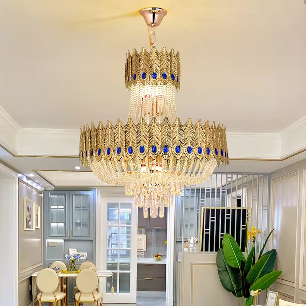 Light luxury double-layer golden leaf blue-decorated crystal chandelier, golden leaf shape + blue decorative blocks + crystal decorations, brilliant and gorgeous lighting, creating a high-end luxurious atmosphere.