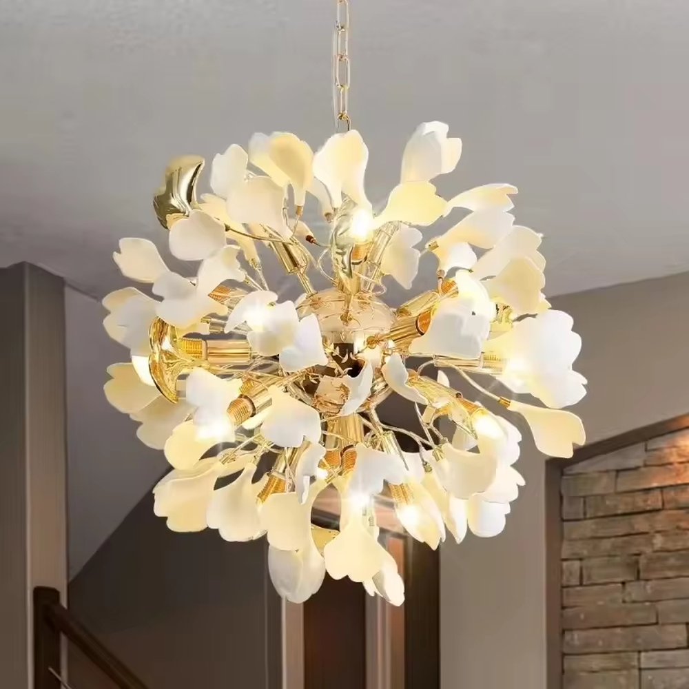 This is a light luxury elegant flower-shaped chandelier, with a golden metal frame paired with white petal lampshades, shaped like a blooming flower. The lighting is soft and warm, suitable for high-end bathroom spaces.