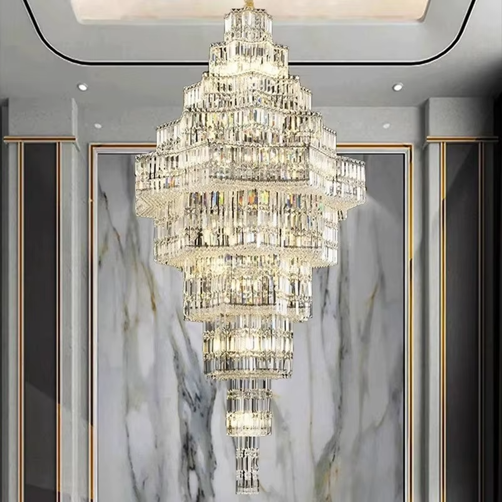 This is a luxury multi-layer pagoda-shaped crystal chandelier, with transparent crystal components in a multi-layer pagoda shape, brilliant lighting, featuring a magnificent and luxurious design with strong visual impact. It is used for space lighting and decoration, creating a high-end luxury atmosphere. It is suitable for high-end hotel lobbies, luxury villa high-ceilinged living rooms, large commercial exhibition halls and other places.
