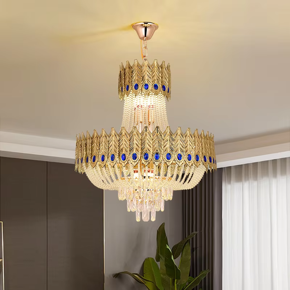 This is a luxurious palace-style double-layer feather gem crystal chandelier, with a golden feather-shaped frame inlaid with blue gem decorations, paired with transparent crystal pendants. The double-layer design is magnificent and grand, with brilliant and elegant lighting, creating a noble and luxurious atmosphere.