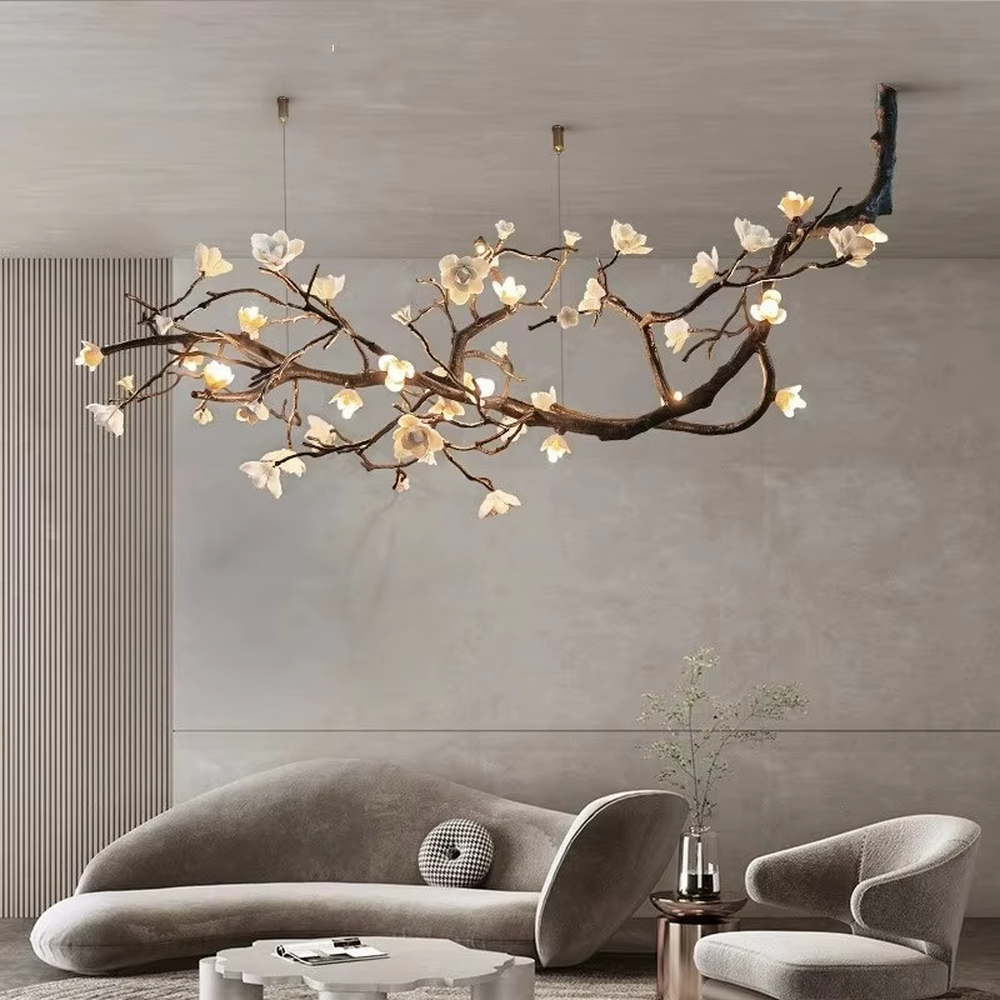 This is a natural artistic flower branch chandelier, with metal branches and white flower shapes, featuring a strong natural artistic sense and elegant fresh style. It is used for space lighting and decoration, creating a natural artistic atmosphere. It is suitable for new Chinese-style home restaurants, homestay leisure areas, artistic-style living rooms and other places.