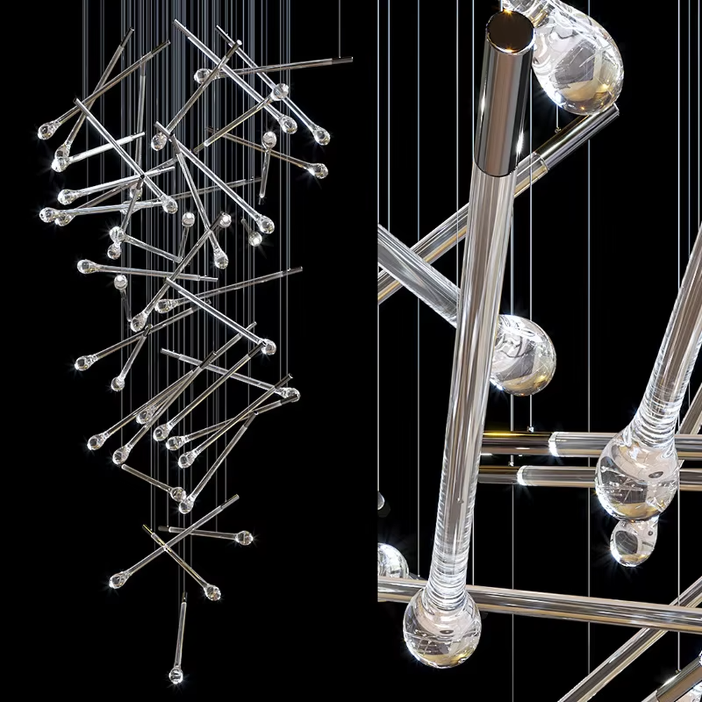 This is a modern artistic transparent crystal rod staggered hanging chandelier, with silver metal slender rods paired with crystal ends, multiple rods staggered and hung. When the lights are on, it is brilliant and dreamy, creating a highly artistic space atmosphere.