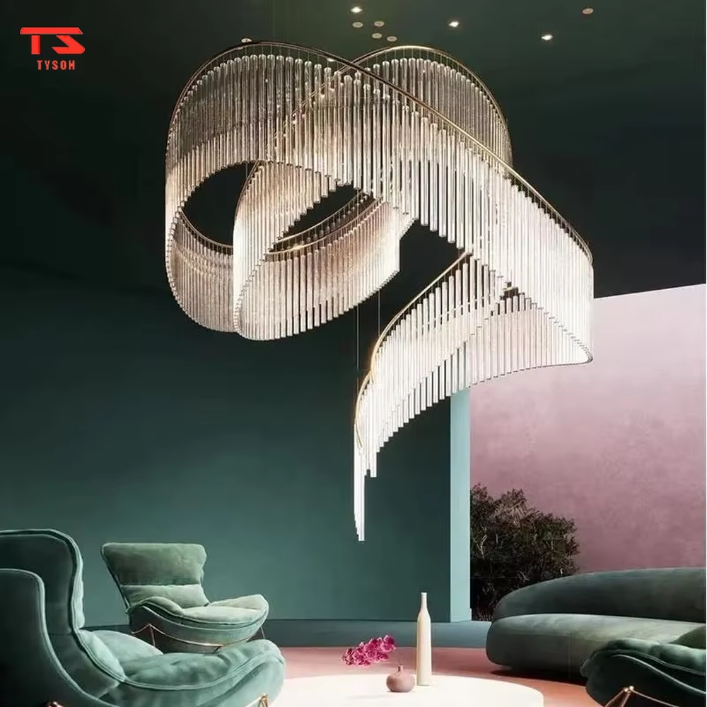 This large custom art chandelier features a gold metal frame paired with hanging crystal tassels to create a flowing ribbon shape, serving both lighting and artistic decoration purposes, ideal for high-ceiling commercial spaces such as high-end clubs, hotel lobbies, and sales offices.