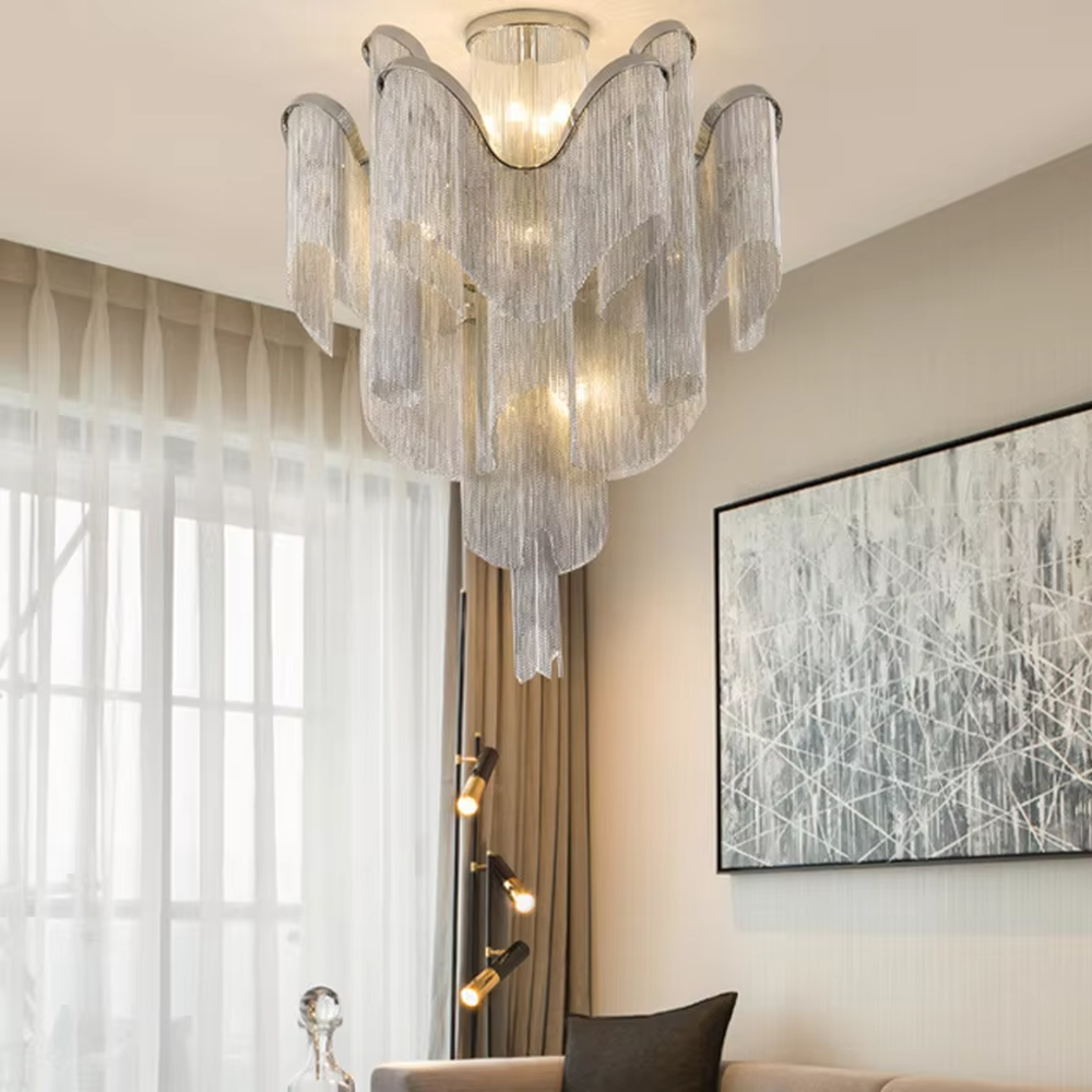 Luxury multi-layer tassel crystal chandelier (gradient crystal tassels + metal frame), warm light effect, creating a magnificent and luxurious high-ceiling space atmosphere.
