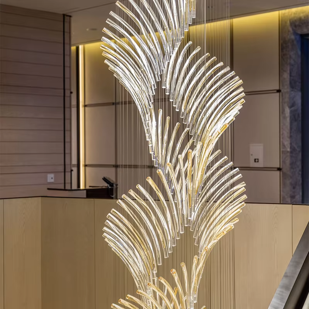 Artistic natural-style gradient light curved transparent tube hanging lamp, transparent curved tubes + gradient warm light, feather-like stretched shape, creating a high-end artistic atmosphere.