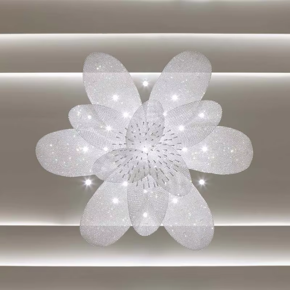 This large-scale art chandelier features a blooming flower shape, with petal structures made of translucent crystal/acrylic material, paired with gradient blue-purple lighting and starry sky accents. It serves both lighting and artistic decorative purposes, ideal for high-ceiling commercial spaces such as hotel lobbies, sales offices, and high-end clubs.