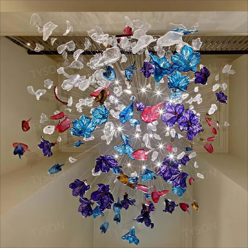 Art Firework Colored Glass Chandelier (blue-purple-red transparent glass petals + radial metal wire frame), warm and cool light effect, creating a bright and dreamy high-end space atmosphere.
