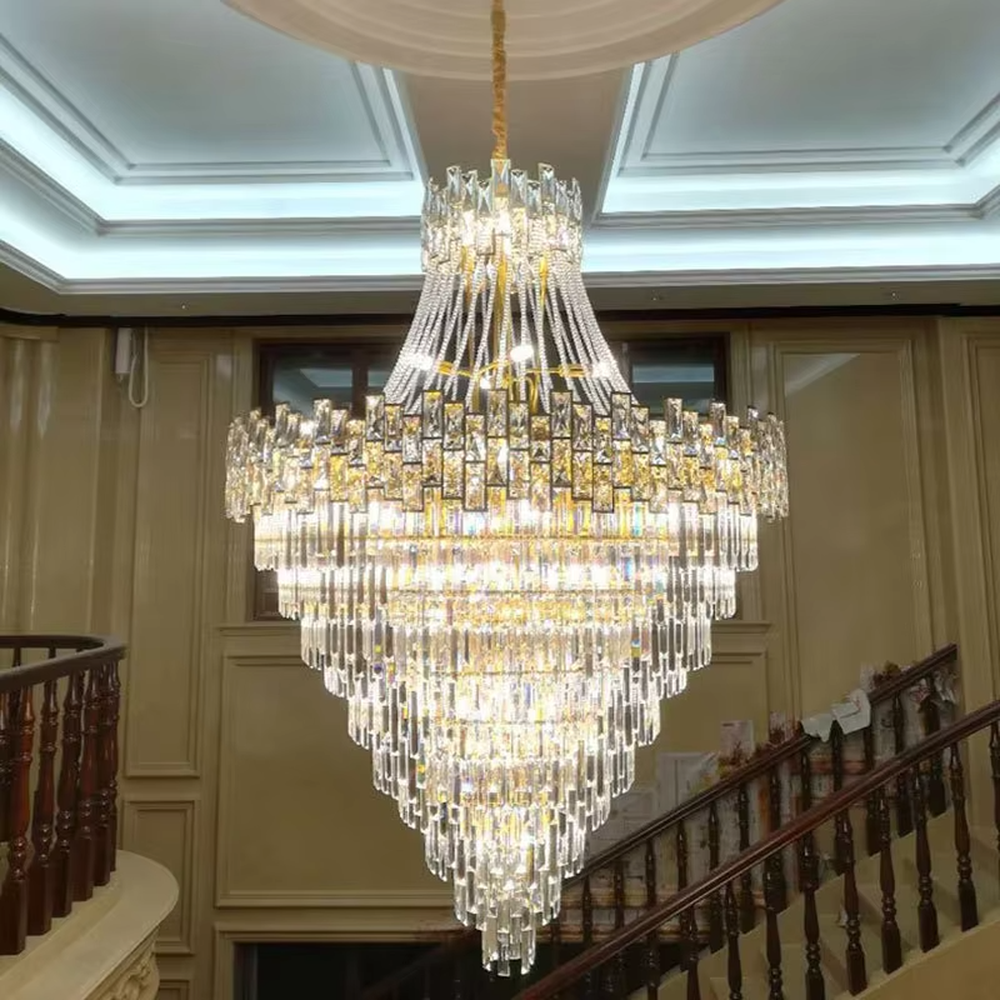 Top-tier luxurious golden frame multi-layer long crystal high-ceiling chandelier, brilliant warm light through crystals, suitable for large-scale high-ceiling spaces.