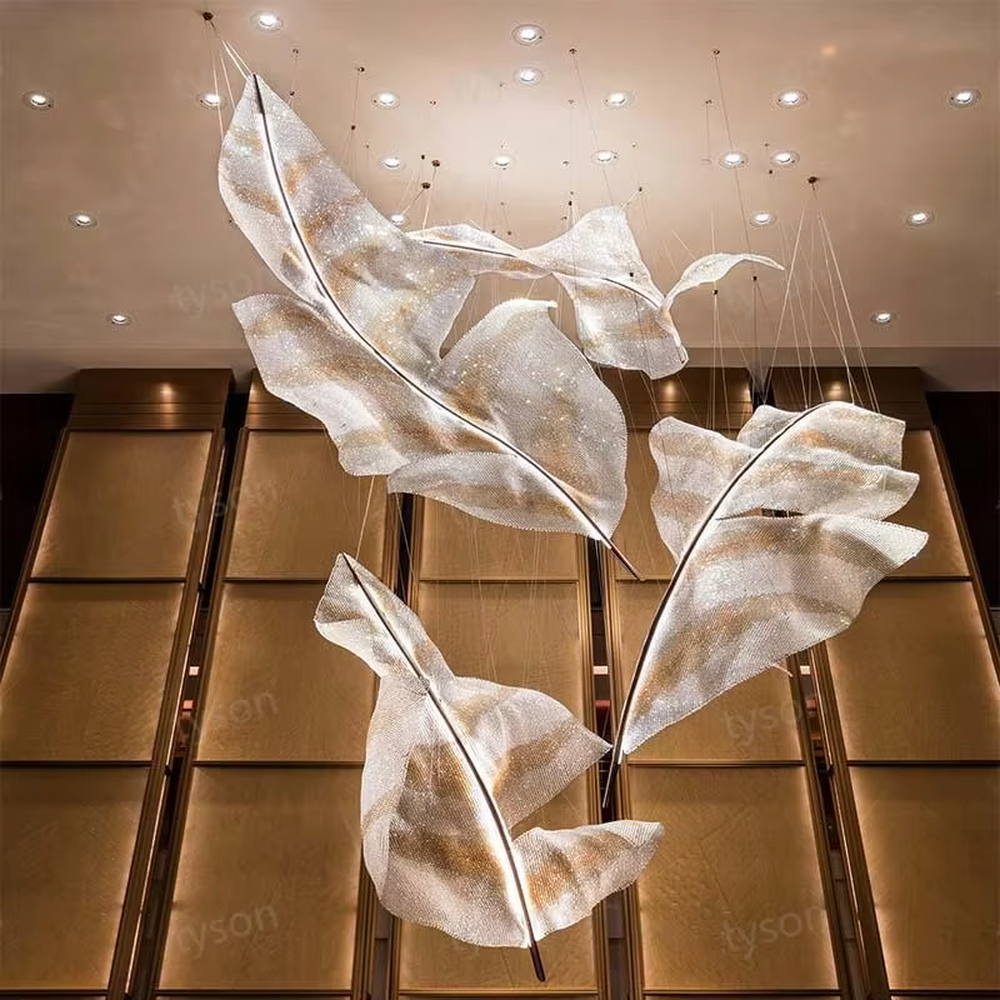 Art feather crystal chandelier (giant crystal feather shape), warm light effect, creating an ethereal and luxurious high-end space atmosphere.