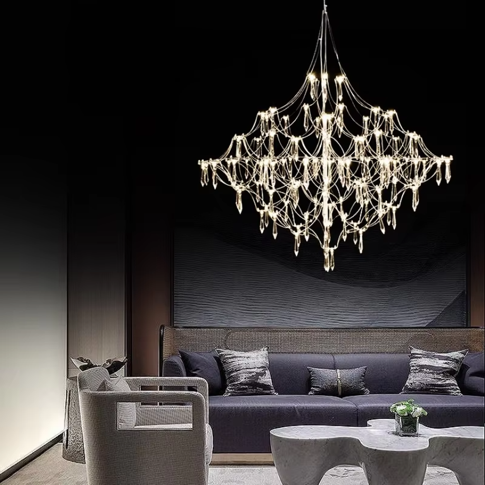 Art cobweb crystal chandelier (crystal pendants + cobweb-style metal wire frame), warm light effect, creating a dreamy and high-end space atmosphere.