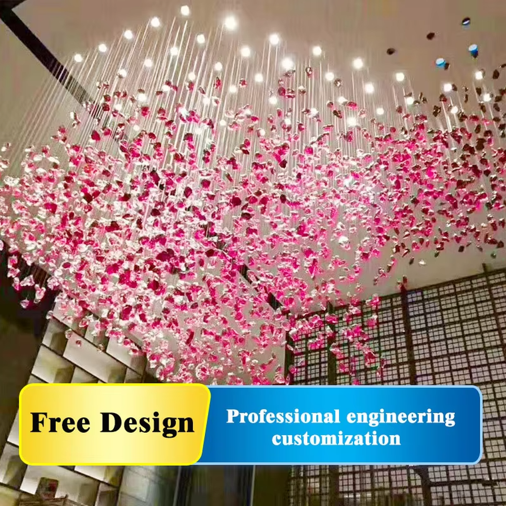 This large-scale art crystal chandelier features a dome pendant shape made of blue-white gradient crystal clusters, like blooming flower clusters or deep-sea ripples. It serves both lighting and artistic decorative purposes, ideal for high-ceiling commercial spaces such as hotel lobbies, sales offices, and high-end clubs.