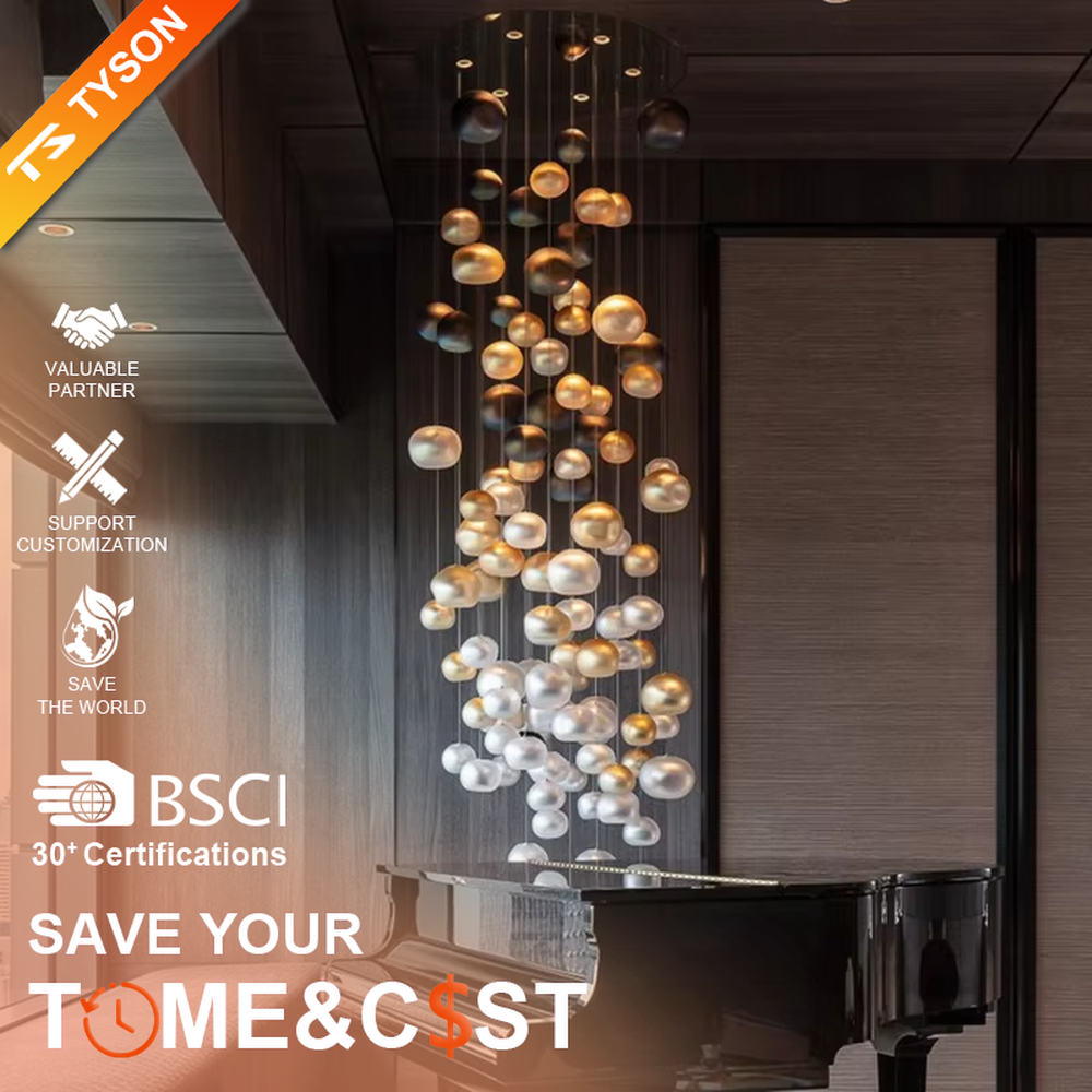 This artistic pendant chandelier consists of spherical lamp shades with a gradient from gold to silver, resembling flowing pearls or bubbles. It serves both lighting and decorative purposes, ideal for high-ceiling spaces, villa living rooms, art galleries, and high-end clubs.