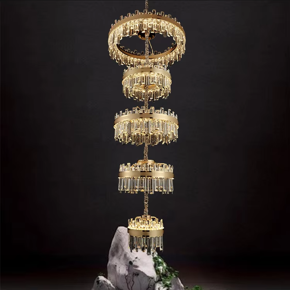 Modern luxurious multi-layer circular golden frame long crystal chandelier, warm light effect, creating a high-end artistic space atmosphere.