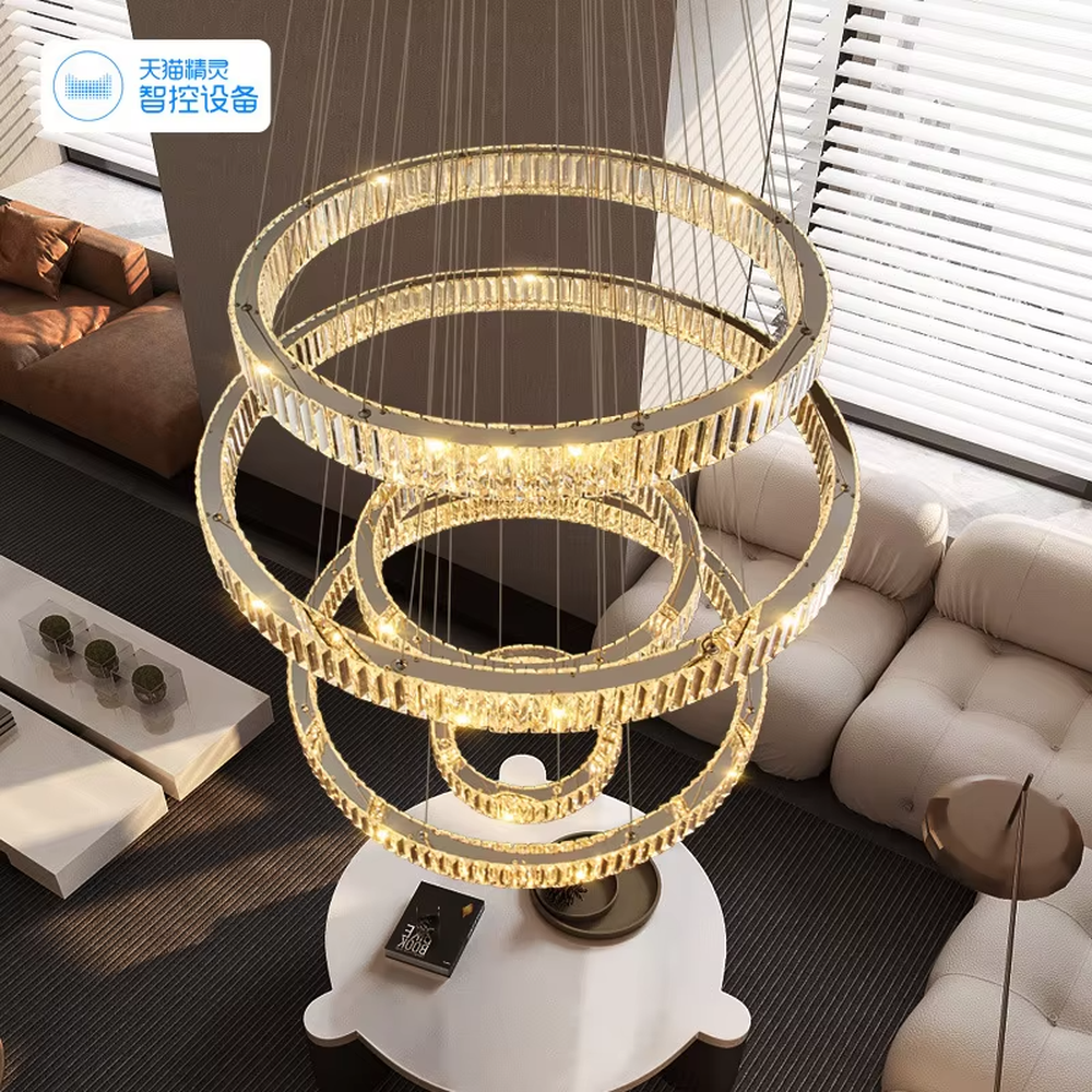This light luxury spiral ring chandelier features a gold metal frame with embedded crystal/acrylic light strips, in a multi-layer scattered spiral shape, serving both lighting and decorative purposes, ideal for high-end high-ceiling spaces such as villa high-ceiling staircases, hotel lobbies, and sales offices.