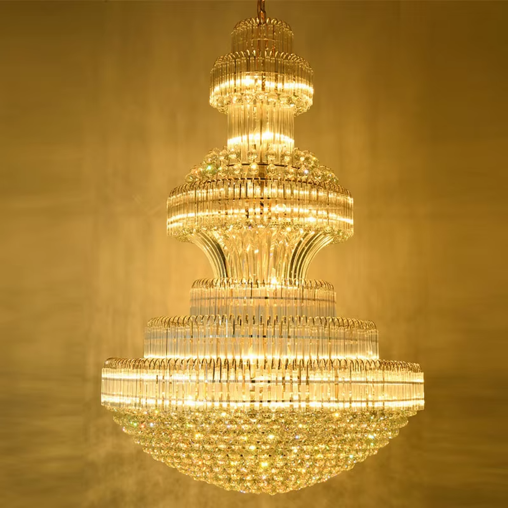 European-style top-luxury multi-layer full golden crystal tower-shaped chandelier, warm light effect, creating an extremely gorgeous top-luxury space atmosphere.