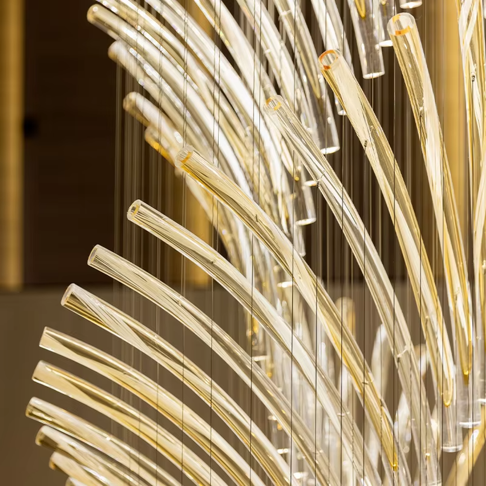 Artistic natural-style gradient light curved transparent tube hanging lamp, transparent curved tubes + gradient warm light, feather-like stretched shape, creating a high-end artistic atmosphere.