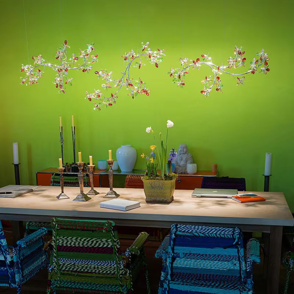 Art butterfly-shaped dark green crystal ceiling chandelier, warm light effect, creating a brilliant and dynamic romantic space atmosphere.