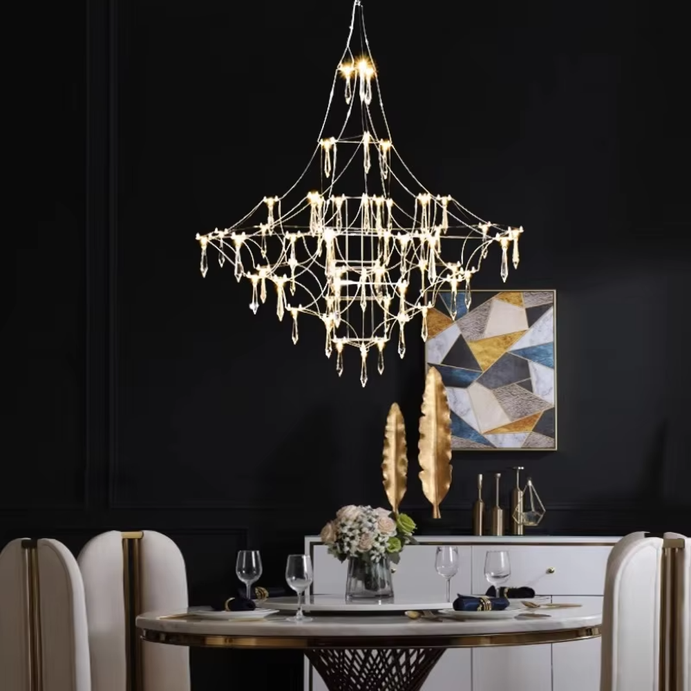 Art cobweb crystal chandelier (crystal pendants + cobweb-style metal wire frame), warm light effect, creating a dreamy and high-end space atmosphere.