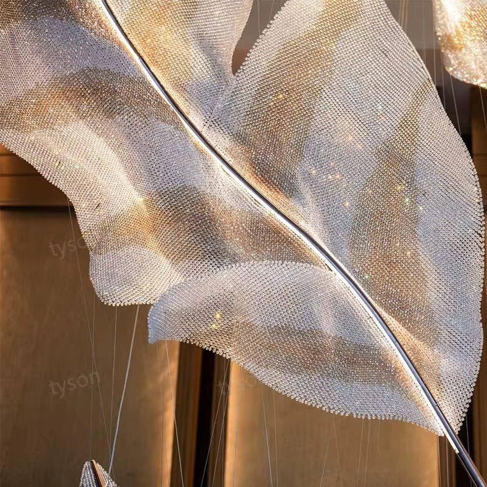 Art feather crystal chandelier (giant crystal feather shape), warm light effect, creating an ethereal and luxurious high-end space atmosphere.