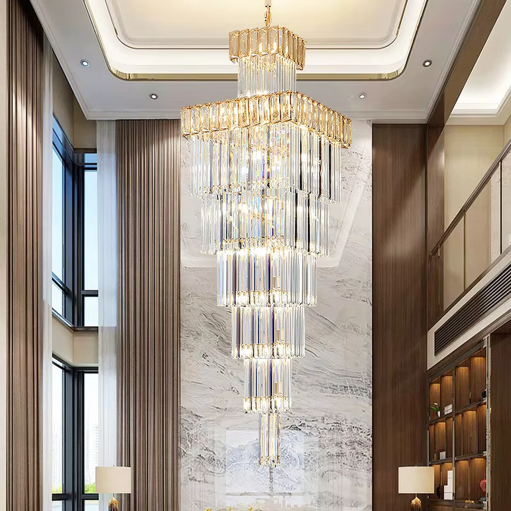 Modern light luxury multi-layer square tower-shaped golden frame crystal chandelier, warm light effect, creating an exquisite and luxurious modern space atmosphere.