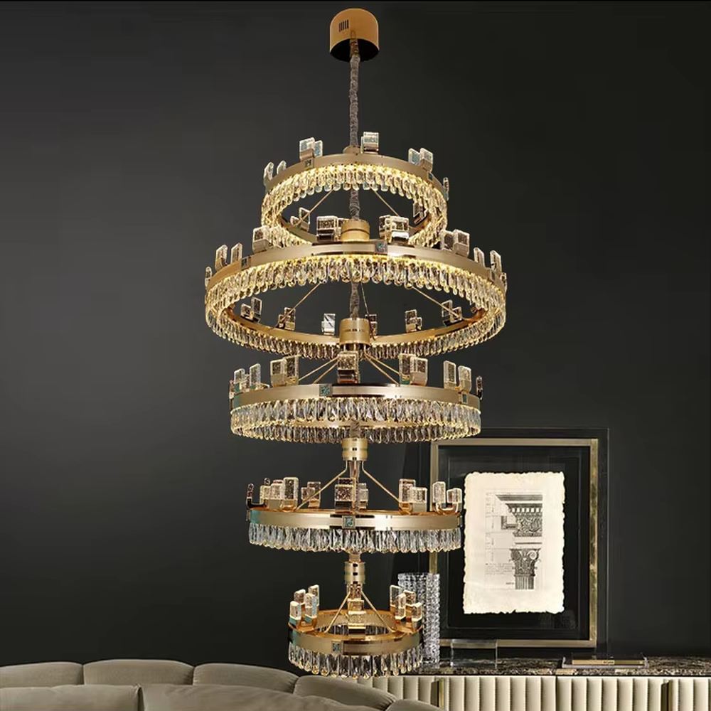 Top-luxury modern multi-layer ring crystal chandelier, golden frame + full crystal inlay + square decorations, brilliant warm light creates luxurious atmosphere in high-ceiling spaces.