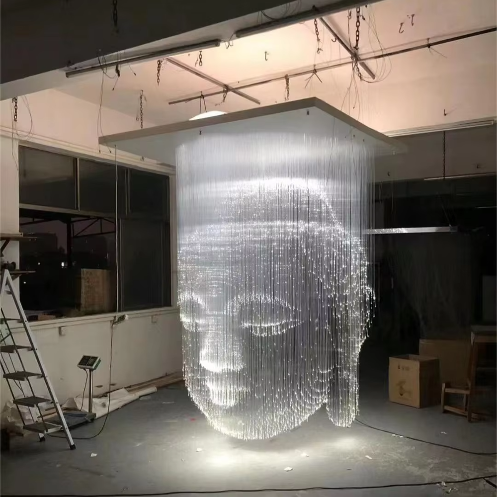 Art portrait light thread chandelier (light thread array + portrait shape), warm light effect, creating a shocking artistic space atmosphere.