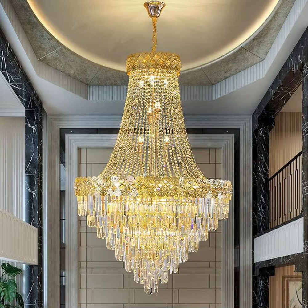 Luxurious umbrella-shaped layered gold-decorated crystal chandelier, golden frame paired with dense crystal pendants and golden decorative patterns, brilliant and gorgeous lighting, creating a high-end luxurious atmosphere.