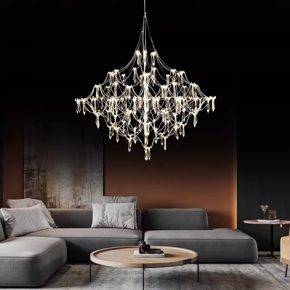 Art cobweb crystal chandelier (crystal pendants + cobweb-style metal wire frame), warm light effect, creating a dreamy and high-end space atmosphere.