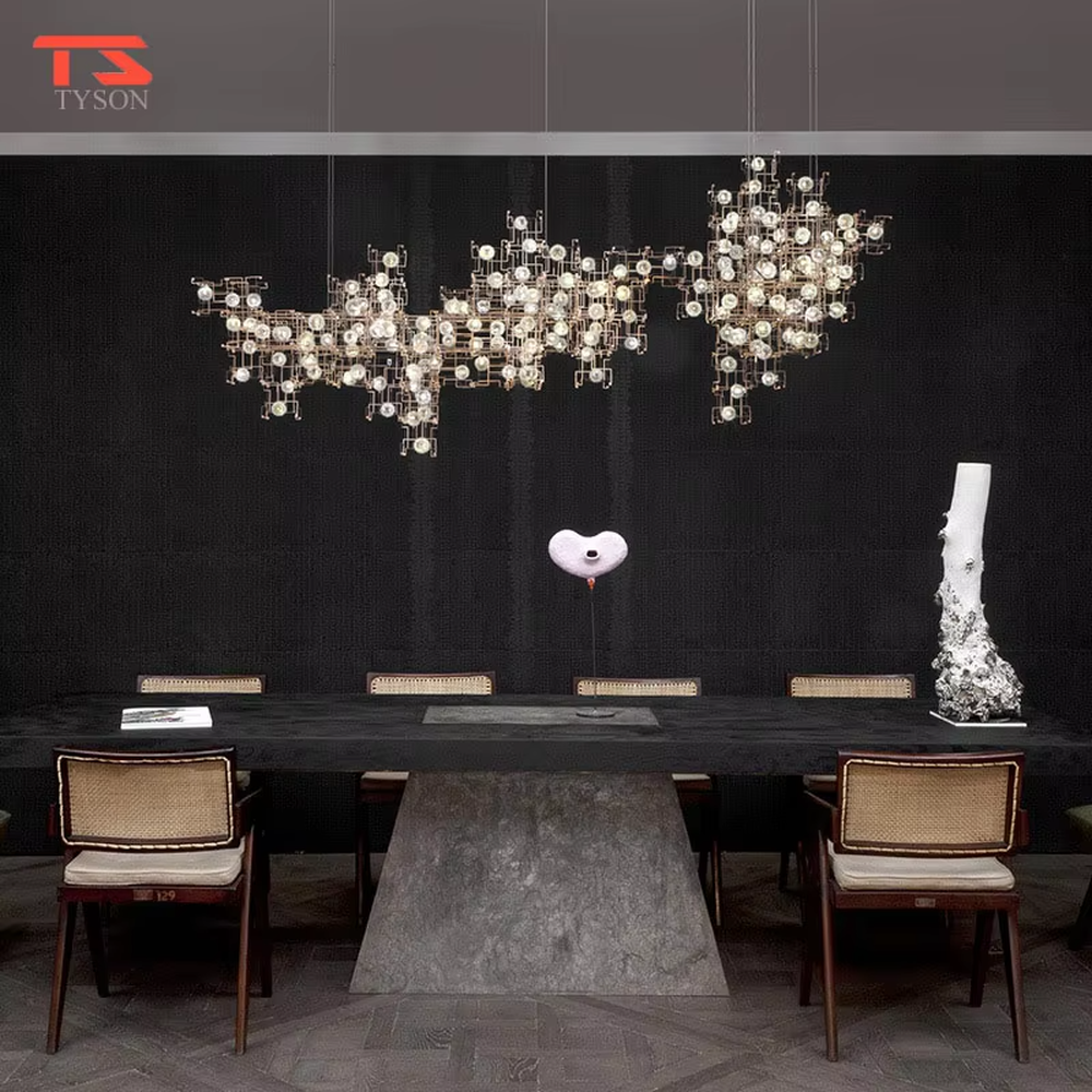 This art chandelier features a gold metal grid frame with embedded luminous light-transmitting balls to create an irregular nebula shape, serving both lighting and artistic decoration purposes, ideal for commercial spaces such as sales offices, art exhibition halls, and high-end clubs.