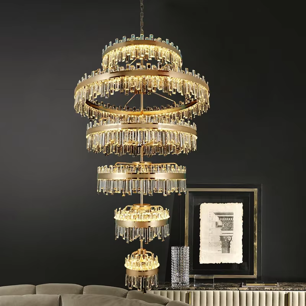 Modern luxurious multi-layer circular golden frame long crystal chandelier, warm light effect, creating a high-end artistic space atmosphere.