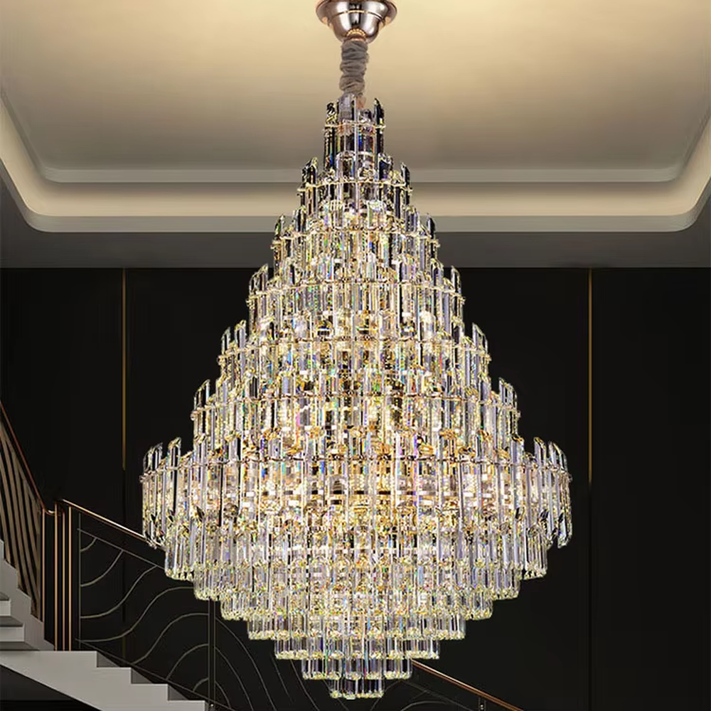 European top-luxury pyramid-shaped golden frame long crystal chandelier, warm light effect, creating a luxurious and magnificent space atmosphere.