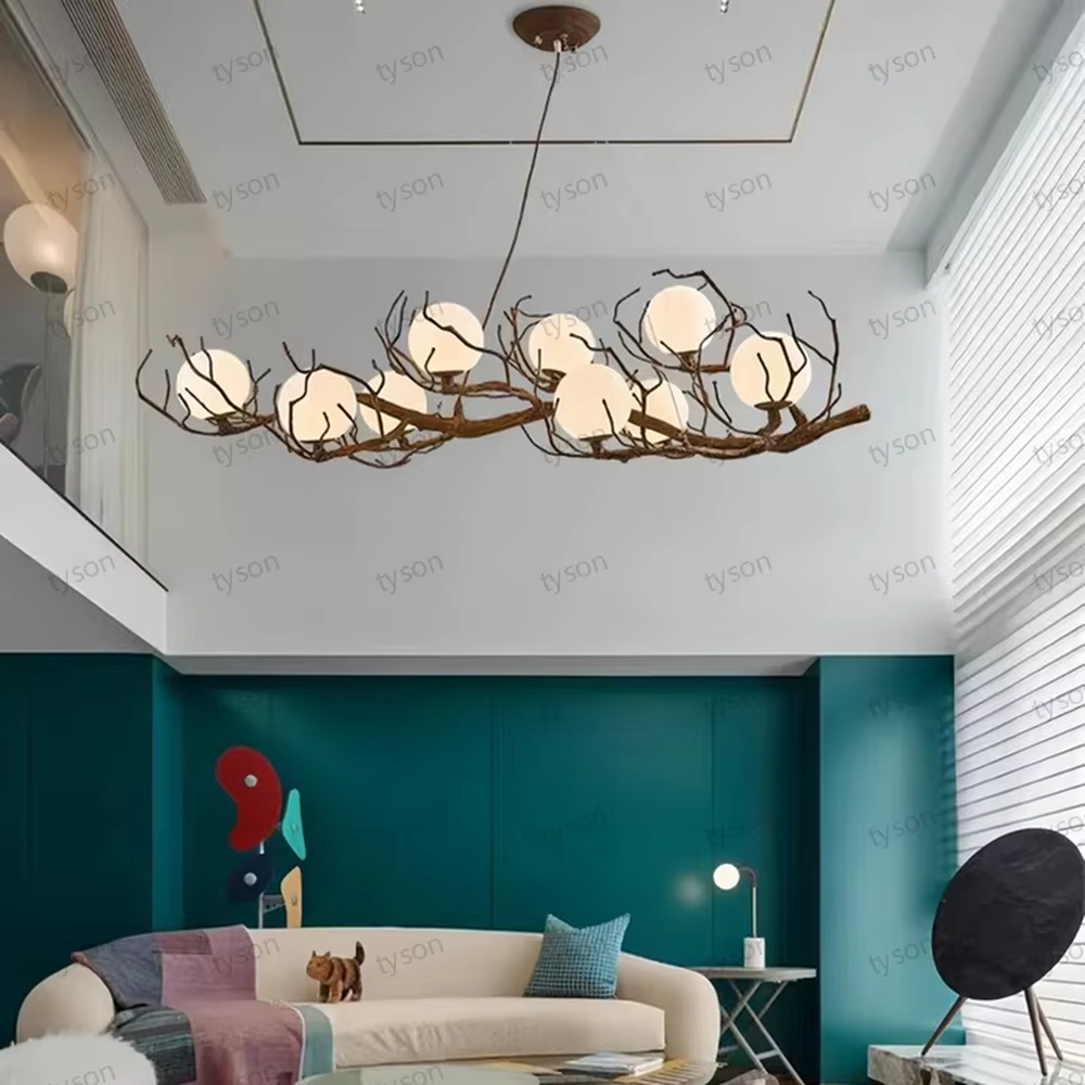 Natural dry branch glass ball chandelier (simulated dry branch frame + milk-white glass balls), warm light effect, creating a forest-style healing space atmosphere.
