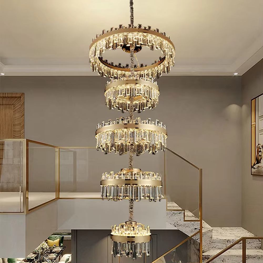 Modern luxurious multi-layer circular golden frame long crystal chandelier, warm light effect, creating a high-end artistic space atmosphere.