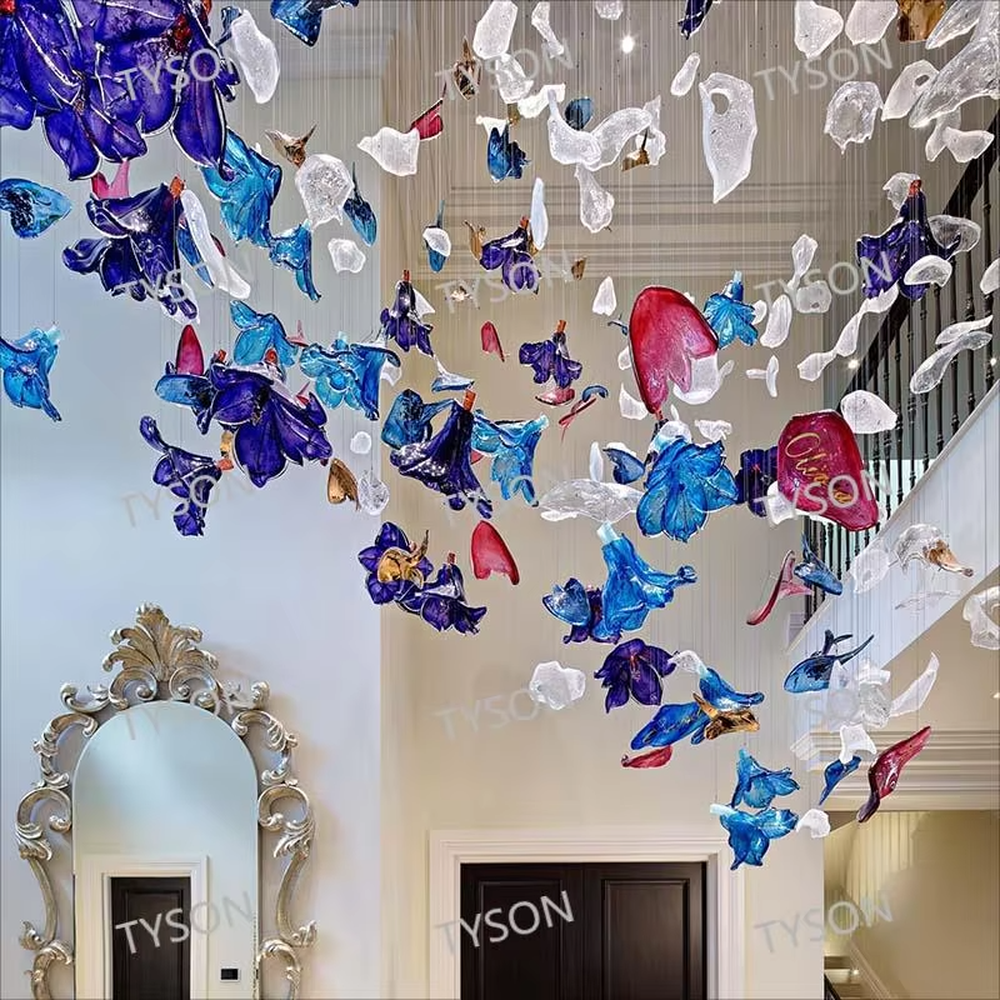 Art Firework Colored Glass Chandelier (blue-purple-red transparent glass petals + radial metal wire frame), warm and cool light effect, creating a bright and dreamy high-end space atmosphere.
