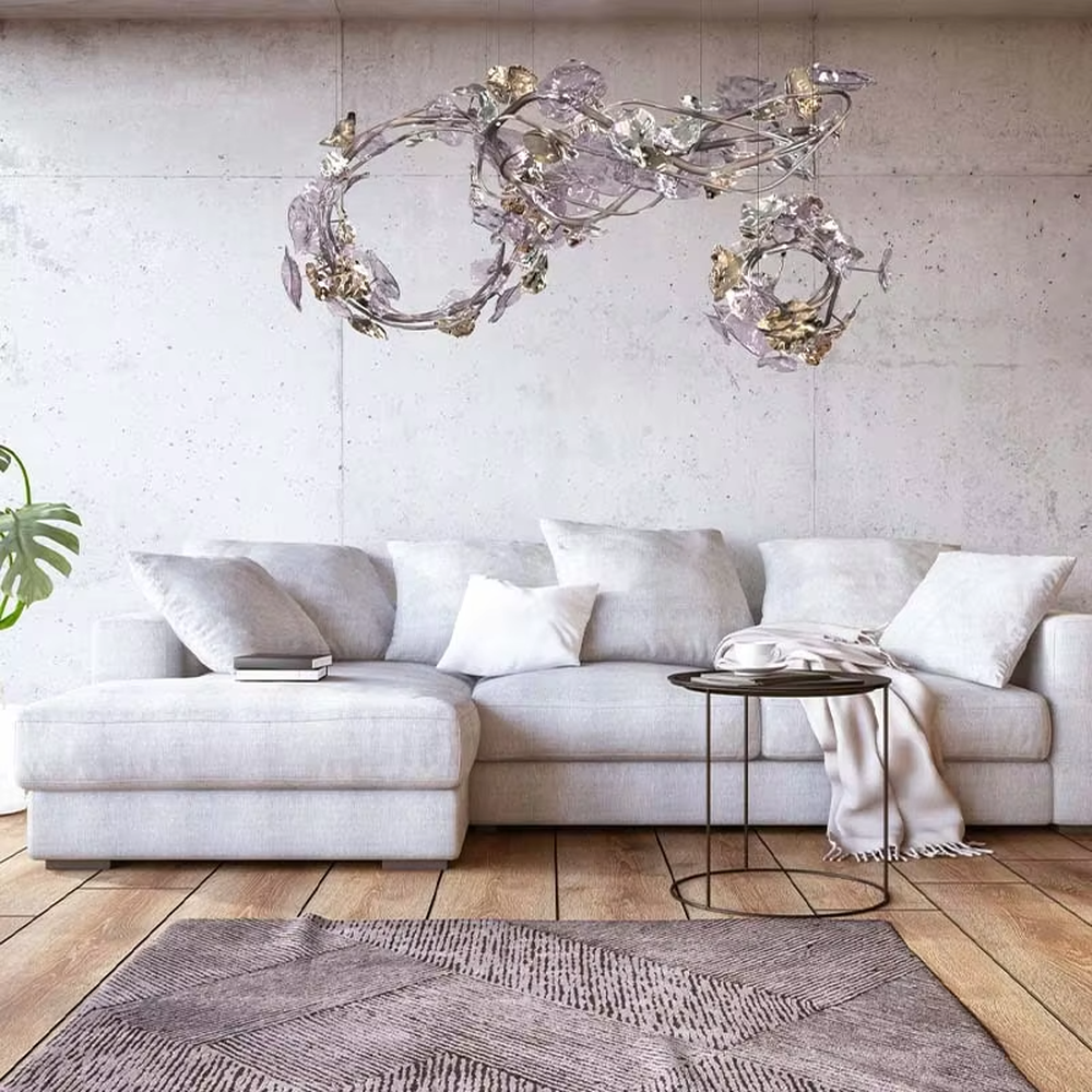 This artistic vine-shaped chandelier features a gold metal frame paired with transparent crystal/glass leaves, presenting natural and vivid irregular lines. It serves both lighting and decorative purposes, ideal for high-ceiling living rooms, high-end clubs, art galleries and other spaces.