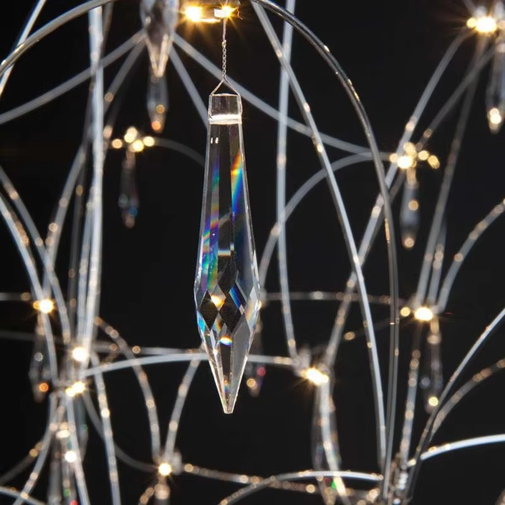 Art cobweb crystal chandelier (crystal pendants + cobweb-style hanging), warm light effect, creating a brilliant and dreamy light luxury space atmosphere.